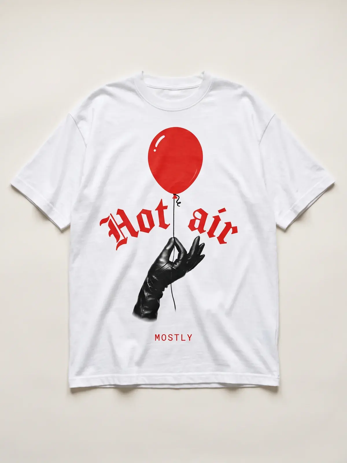 The Hot air tee laid flat on paper