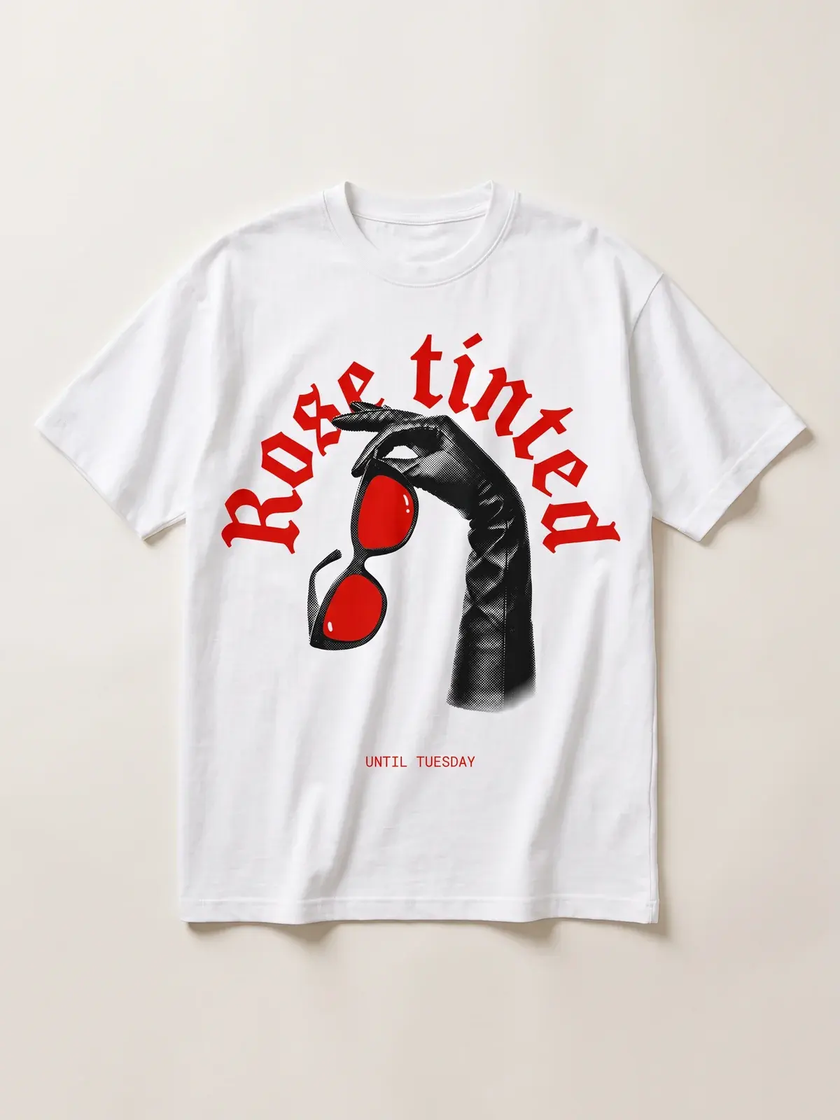 The Rose tinted tee laid flat on paper